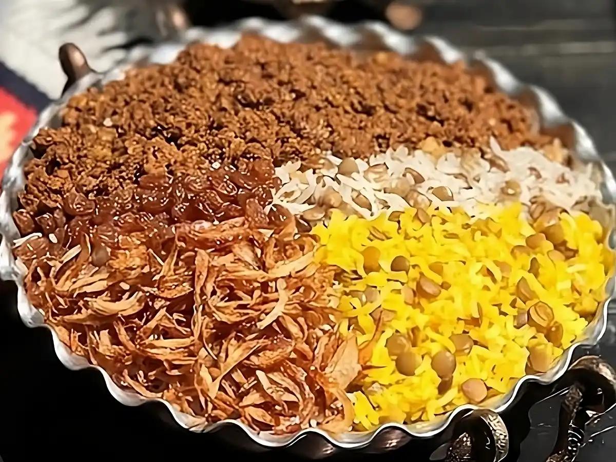 طرز تهیه عدس پلو زعفرانی خوشمزه و مجلسی به روش نذری/طرز تهیه عدس پلو